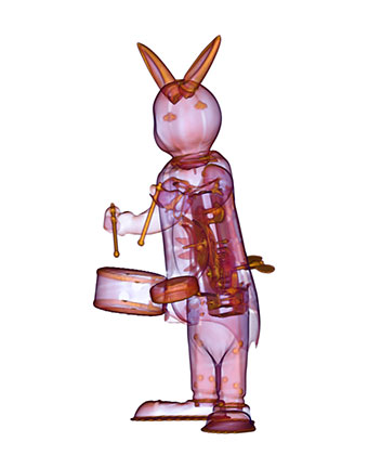 Illustration for article titled CT Scanner Bares Apple Notebook, PS3, and Big Mac to Their Core
